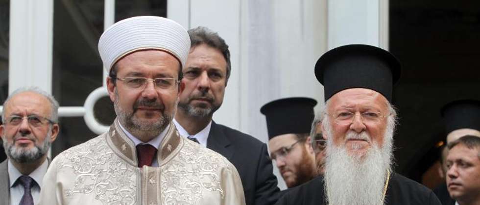 The head of Turkey's Religious Affairs Directorate Mehmet Gormez (L) and Ecumenical Patriarch of Constantinople Bartholomew (R) pose after their meeting at the Eastern Greek Orthodox Patriarchate in Istanbul, on July 5, 2012 ( Saygin Serdaroglu (AFP/File) )