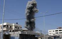 Smoke rises following an Israeli air strike on a Palestinian home in Gaza City on August 23, 2014 ( Thomas Coex (AFP) )