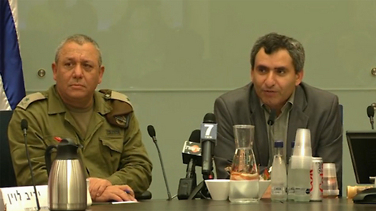 Chairman of the Knesset Foreign Affairs and Defense Committee, MK Ze'ev Elkin (right) with senior military official during Gaza operation