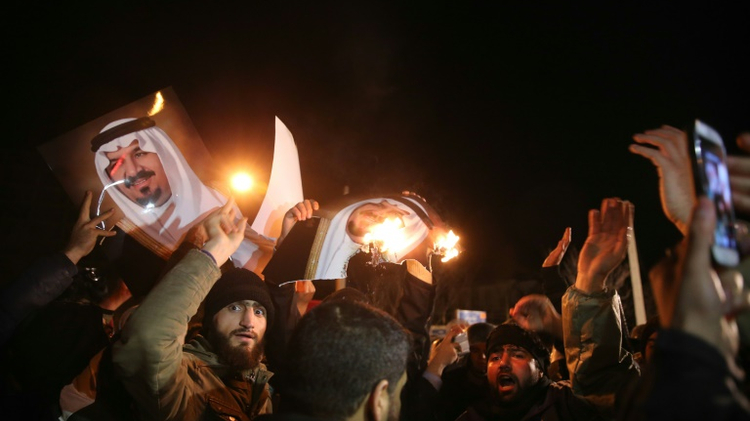Iranian protesters gather outside the Saudi Embassy in Tehran during a demonstration against the execution of prominent Shiite Muslim cleric Nimr al-Nimr by Saudi authorities, on January 2, 2016