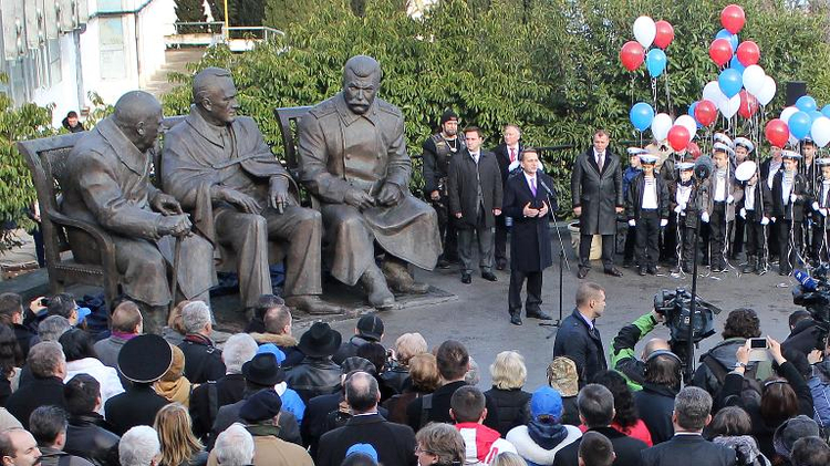 Russia's speaker of parliament's lower house, Sergei Naryshkin (C), attends the opening ceremony for a monument outside Yalta, in Crimea on February 5, 2015