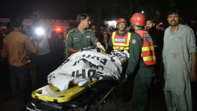 Rescue teams respond to the site of an explosion in Lahore, Pakistan, March 27, 2016