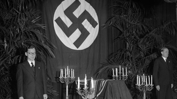 The Nazi flag-draped coffin of German diplomat Ernst Vom Rath at the German embassy in Paris during his funeral on November 12, 1938