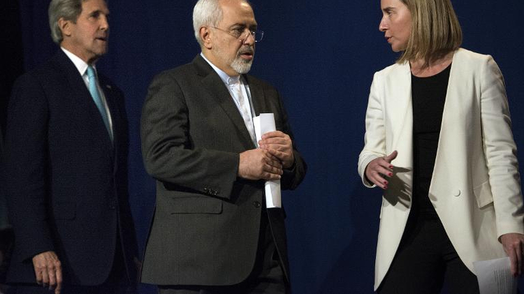 (From L) US Secretary of State John Kerry, Iranian Foreign Minister Javad Zarif and European Union High Representative for Foreign Affairs and Security Policy Federica Mogherini arrive to deliver a statement in Lausanne, Switzerland, on April 2, 2015