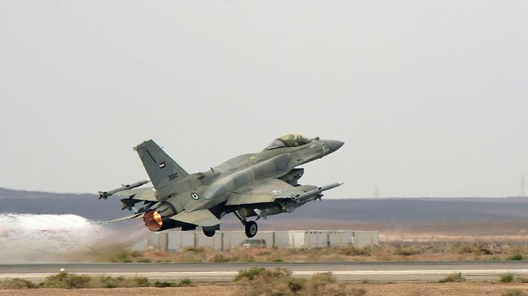 Image made available on February 16, 2015 by the United Arab Emirates News Agency (WAM) shows F-16 jets of the UAE armed forces taking off from a base in Jordan to raid Islamic State (IS) group positions