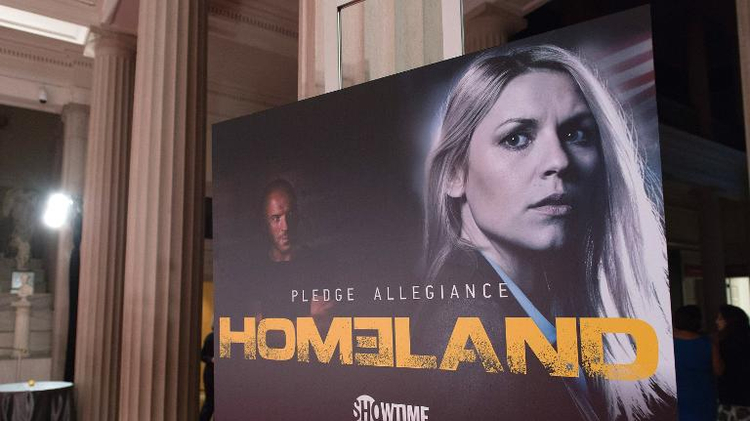 Une affiche de la série Homeland lors de la projection du début de la 3e saison, le 9 septembre 2013 à Washington