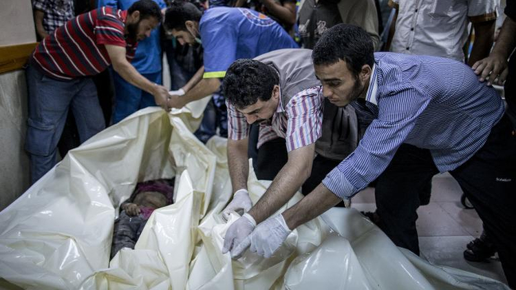 Les corps d'enfants palestiniens tués dans des raids aériens israéliens, le 21 juillet 2014 à l'hôpital al-Shifa à Gaza