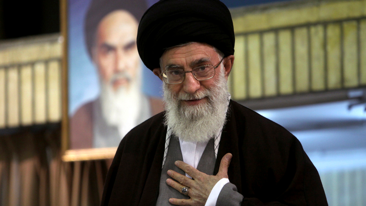 Iran's Supreme Leader Ayatollah Ali Khamenei greets clerics during a meeting in Tehran in this December 13, 2009 file photo.