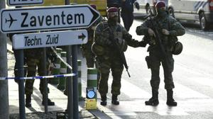 Brussels Airport reopens with three flights, tighter security