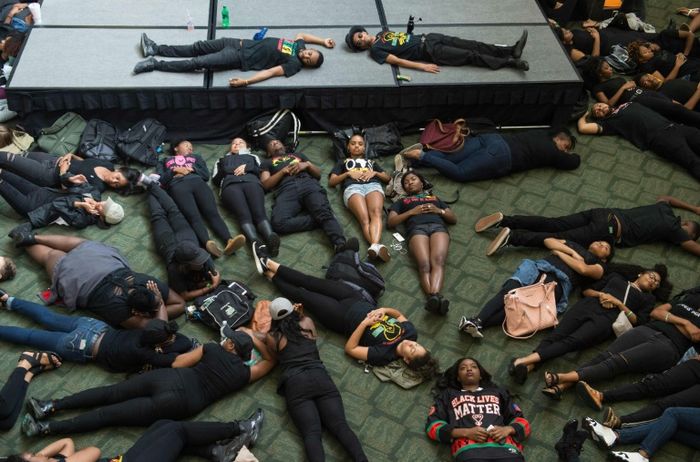 Students take part in a lie-in at the University of North Carolina in Charlotte, North Carolina, on September 21, 2016 in protest against police brutality following the shooting of Keith Lamont Scott nearby the previous day Nicholas Kamm (AFP)
