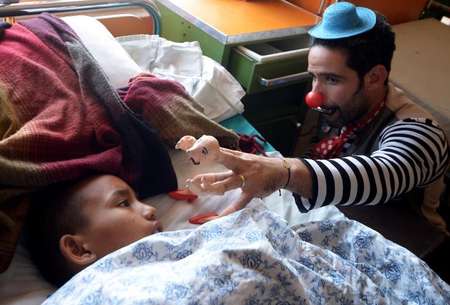 Israeli "medical clowns" last visited Nepal in 2012 but are now returning to help children scarred by the devastating earthquake that killed more than 7,600 people - Prakash Mathema (AFP/File) Prakash Mathema (AFP/File)