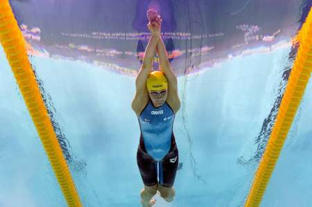 i24NEWS - Sjostrom breaks 100m fly swimming record, wins worlds gold