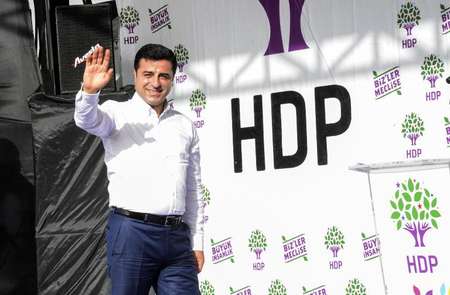 Leader of the pro-Kurdish Peoples' Democratic Party (HDP), Selahattin Demirtas, waves as he attends an election rally on June 3, 2015 in Mardin - Ilyas Akengin (AFP/File) Ilyas Akengin (AFP/File)