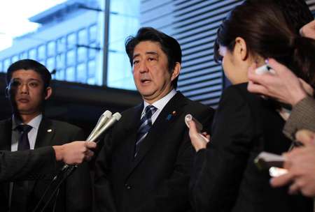 Japanese Prime Minister Shinzo Abe speaks to reporters at his official residence in Tokyo on February 1, 2015 - Yoshikazu Tsuno (AFP) Yoshikazu Tsuno (AFP)