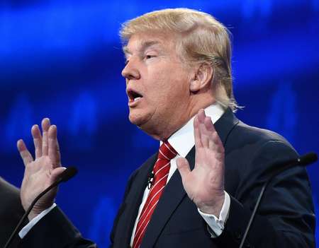 Republican presidential hopeful Donald Trump, facing a slip in his poll ratings, seemed determined to reaffirm his position atop the Republican pyramid ( Robyn Beck (AFP) )
