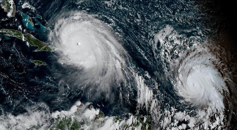 Emmanuel Macron vows to rebuild France's hurricane-devastated islands Emmanuel Macron vows to rebuild France's hurricane-devastated islands