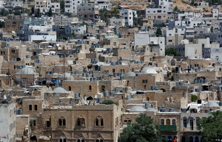 At least 15 Jewish families move into disputed West Bank building At least 15 Jewish families move into disputed West Bank building