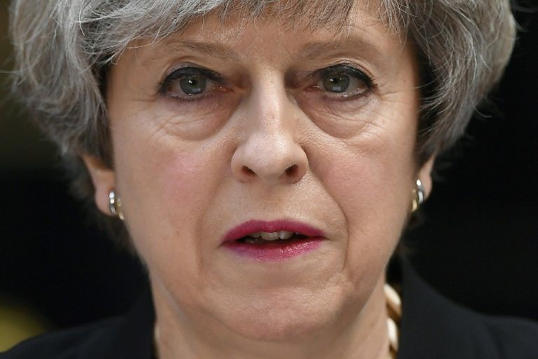 British Prime Minister May vows to form government after losing majority