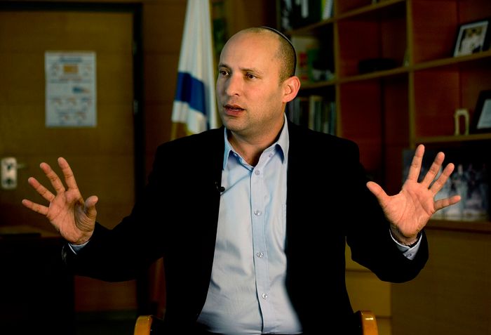 Naftali Bennett, leader of the Jewish Home party, speaks during an interview to the Associated Press in Jerusalem, Monday, Feb. 16, 2015. With Benjamin Netanyahu under fire internationally for his hardline policies, a key partner of Israeli prime minister