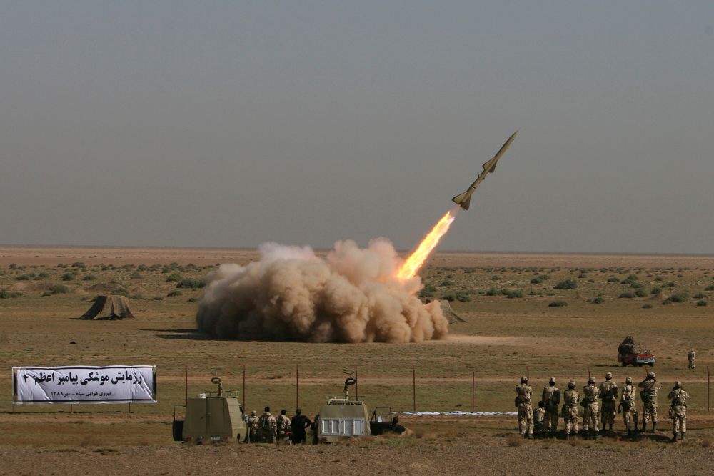 In this photo released by the Iranian semi-official Fars News Agency, Revolutionary Guard's Tondar missile is launched in a drill, Sunday Sept. 27, 2009, near the city of Qom, 80 miles (130 kilometers) south of Tehran, Iran.