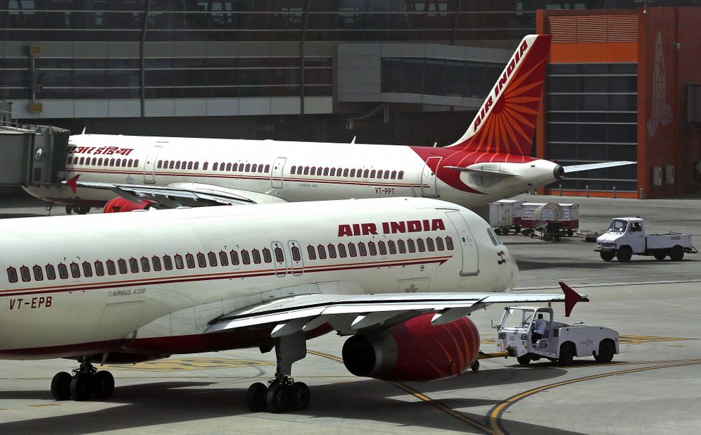 (AP Photo/Kevin Frayer) Illustrative: Air India planes parked on the tarmac at the Indira Gandhi International Airport in New Delhi, India, on May 18, 2012.