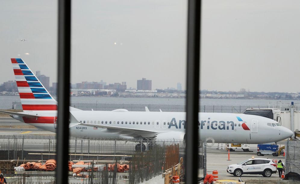 AP / Frank Franklin II 2019 © An American Airlines Boeing 737 MAX 8 plane sits at a boarding gate at LaGuardia Airport March 13, 2019, in New York. The Federal Aviation Administration issued an emergency order grounding all Max aircrafts in the wake of the deadly Ethiopia crash.