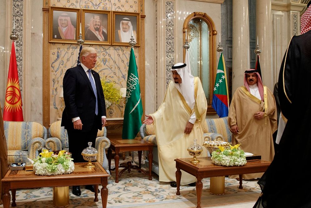 (AP Photo/Evan Vucci) FILE: Saudi King Salman, second right, invites U.S. President Donald Trump to sit during a meeting at the Gulf Cooperation Council Summit, at the King Abdulaziz Conference Center, Sunday, May 21, 2017, in Riyadh, Saudi Arabia. Trump will use the nation th