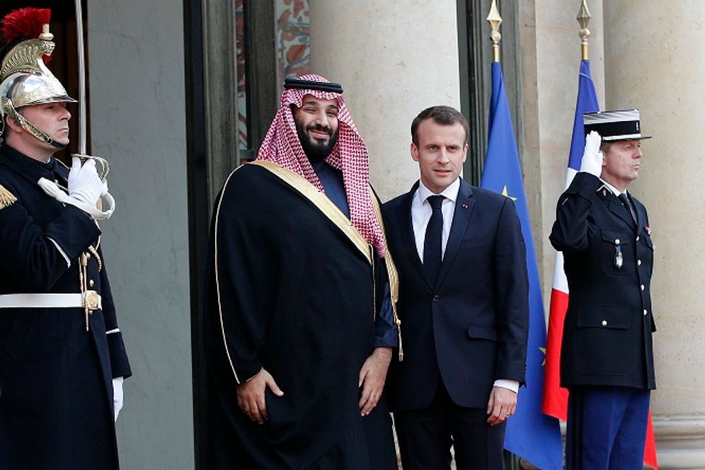 (AP Photo/Christophe Ena) FILE: French President Emmanuel Macron, right, poses with Saudi Arabia Crown Prince Mohammed bin Salman before a meeting at the Elysee Palace in Paris, Tuesday, April 10, 2018. Macron meets with Prince Mohammed in Paris to bolster economic ties and streng