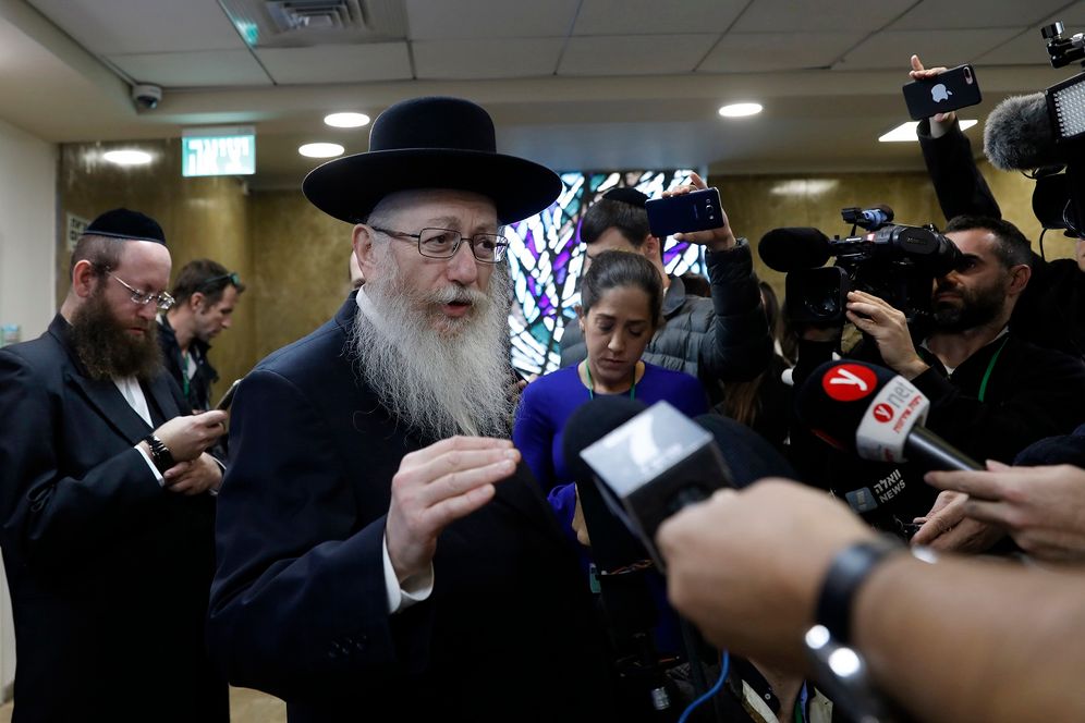 Israeli Health Minister Yaakov Litzman, who is also chairman of the ultra-Orthodox United Torah Judaism party, speaks to journalists after handing in his resignation to Israel's Prime Minister Benjamin Netanyahu, in Jerusalem, Sunday, Nov. 26, 2017.