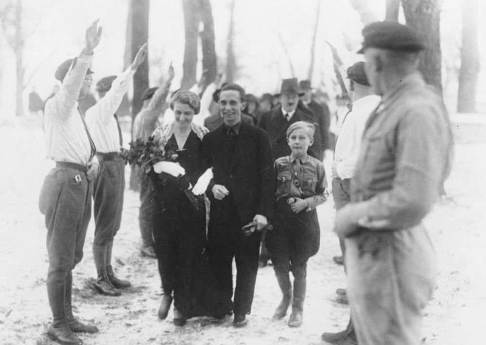 Wedding of Magda and Joseph Goebbels in 1931, with Hitler seen in background