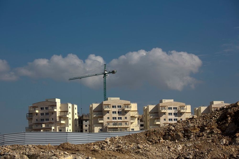 Tuesday, Jan. 1, 2019 photo, shows a new housing project in a West Bank settlement after AP report details Israel's emboldened settlement construction under US President Trump