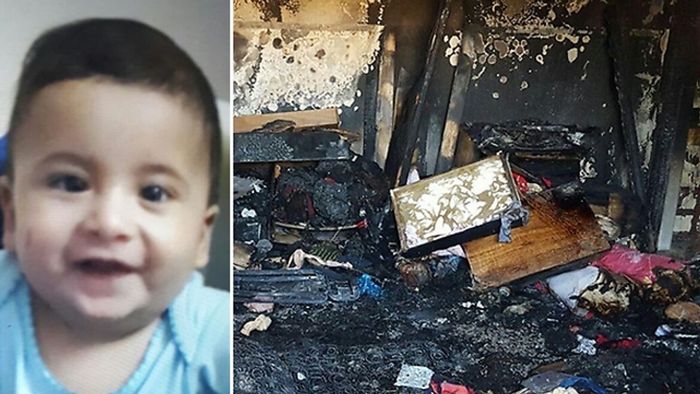 A photo shows the burnt home of the Dawabsheh family and their toddler who was killed in an arson attack on Thursday July 30, 2015