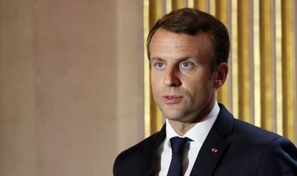 French President Emmanuel Macron said he was working with Senegal to boost the Global Partnership for Education to expand and improve schooling around the world