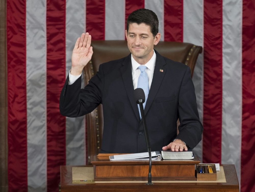 Newly elected Speaker of the House Paul Ryan, Republican of Wisconsin, takes the oath at the US Capitol on October 29, 2015