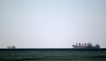 Tankers pass through the Strait of Hormuz at the head of the Gulf which Iranian President Hassan Rouhani has again threatened to close to oil traffic in response to US sanctions