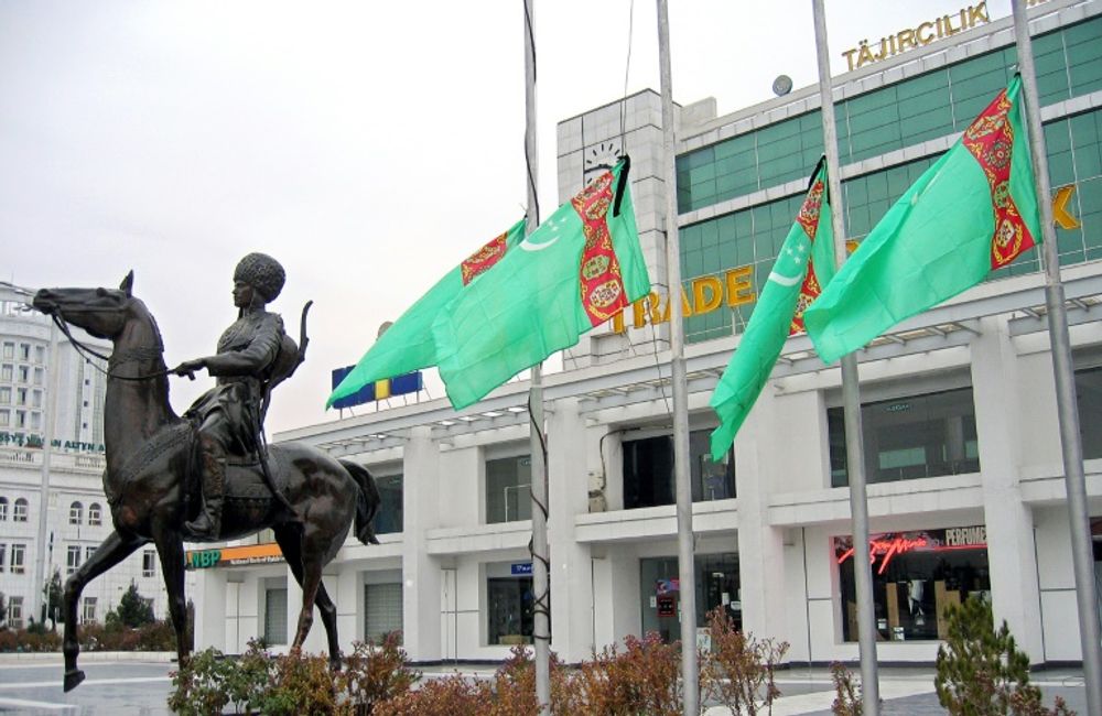 Turkmenistan flags fly in the capital city of Ashgabat.