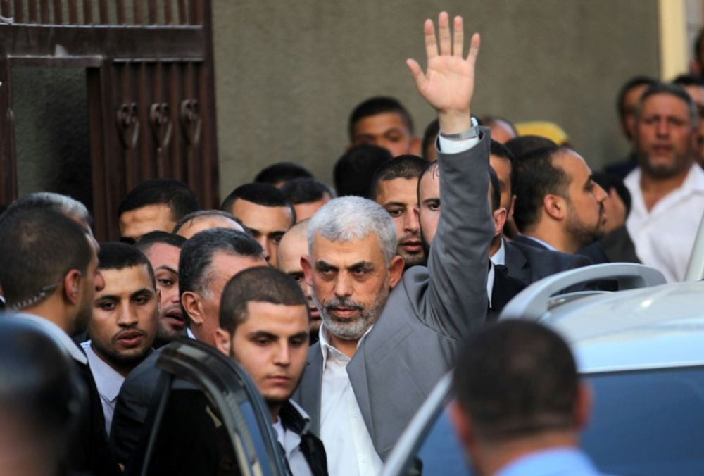 Hamas's leader in the Gaza Strip Yahya Sinwar (C) arrives for a meeting with Palestinian prime minister and other officials in Gaza City on October 2, 2017