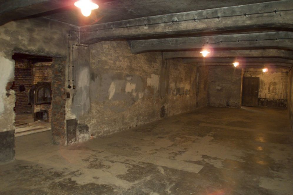 A gas chamber and entrance on the left to the crematorium at Auschwitz