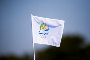A pin flag flies at the Rio Olympic golf course on August 5, 2016