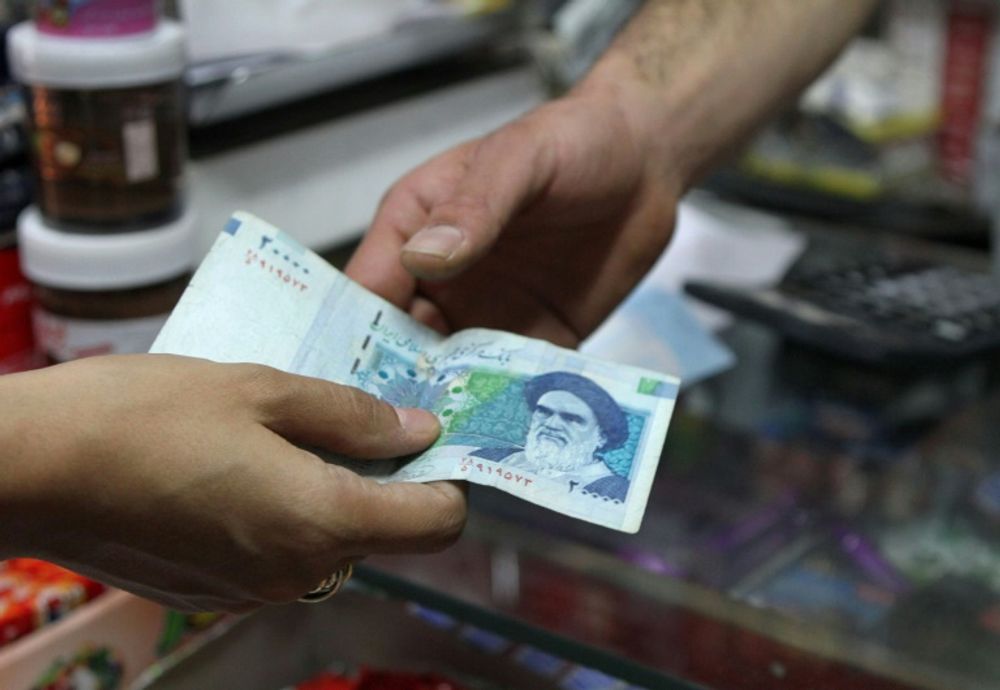 The Iranian rial sunk to a record low.