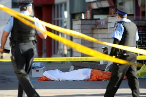 Van plows into Toronto crowd in 'deliberate' act, leaving 10 dead