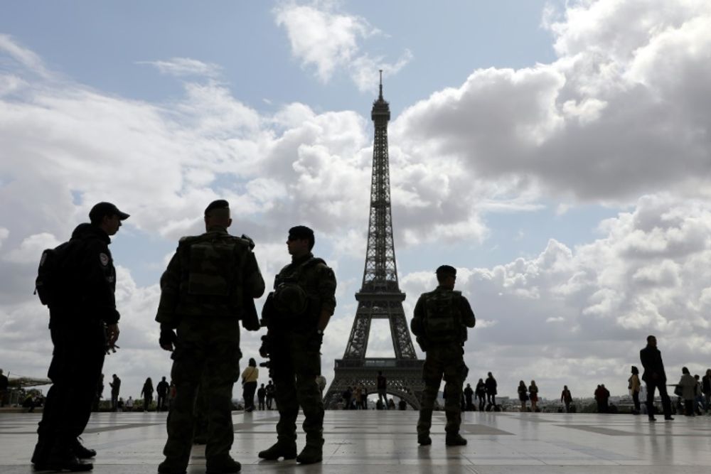 Man attack. Soldier in Paris engine extreme. France Security Policy.