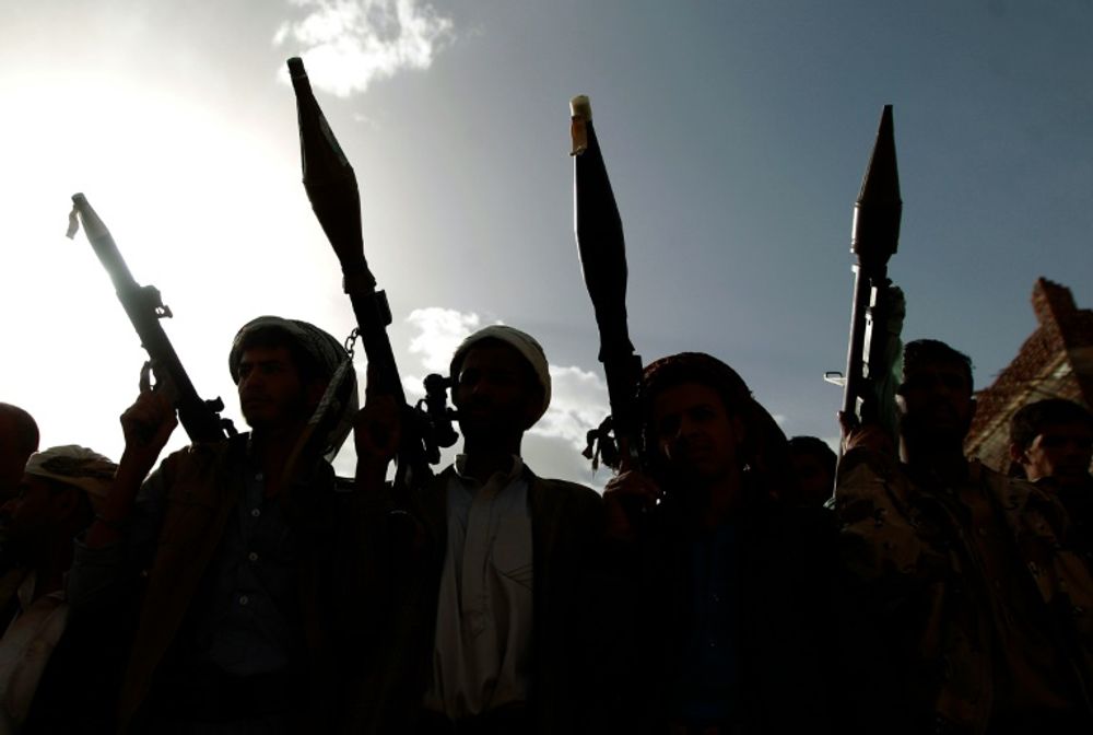 Des combattants alliés aux rebelles chiites Houthis lors d'un rassemblement à Sanaa, le 20 juin 2016