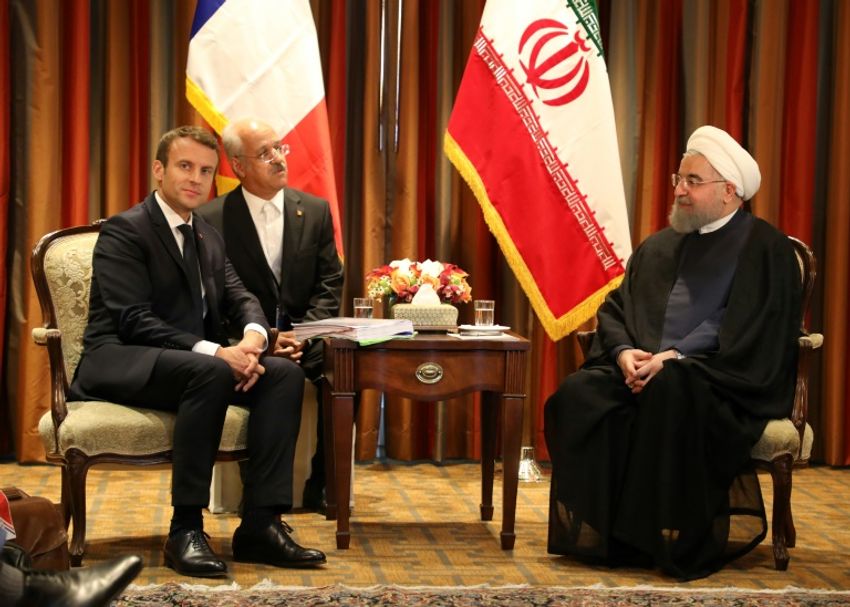 France's President Emmanuel Macron (L) meets with Iranian president Hassan Rouhani (R) in New York for the UN General Assembly on September 18, 2017