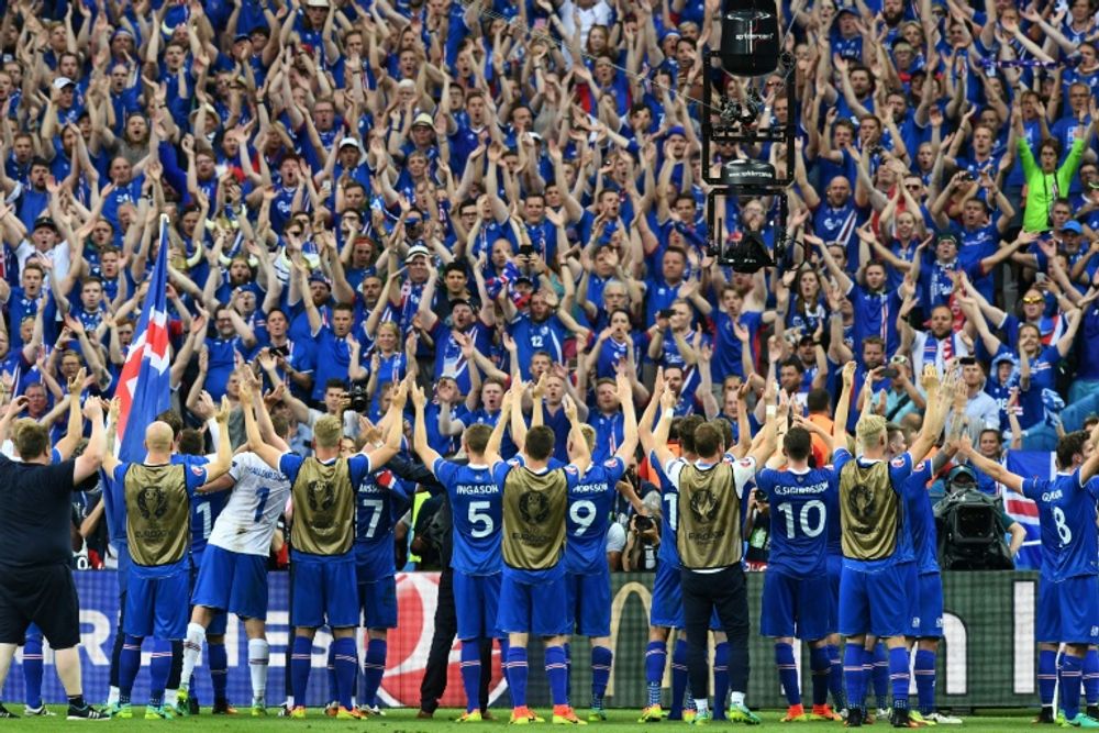 Iceland's players celebrate after the Euro 2016 group F football match between Iceland and Austria in June