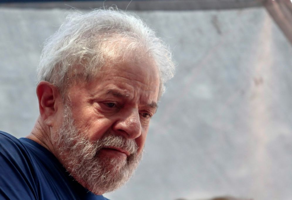Brazilian ex-president Luiz Inacio Lula da Silva gestures on Saturday during a Catholic mass in memory of his late wife Marisa Leticia, at the metalworkers' union building where is holed up in Sao Bernardo do Campo, in Sao Paulo, Brazil