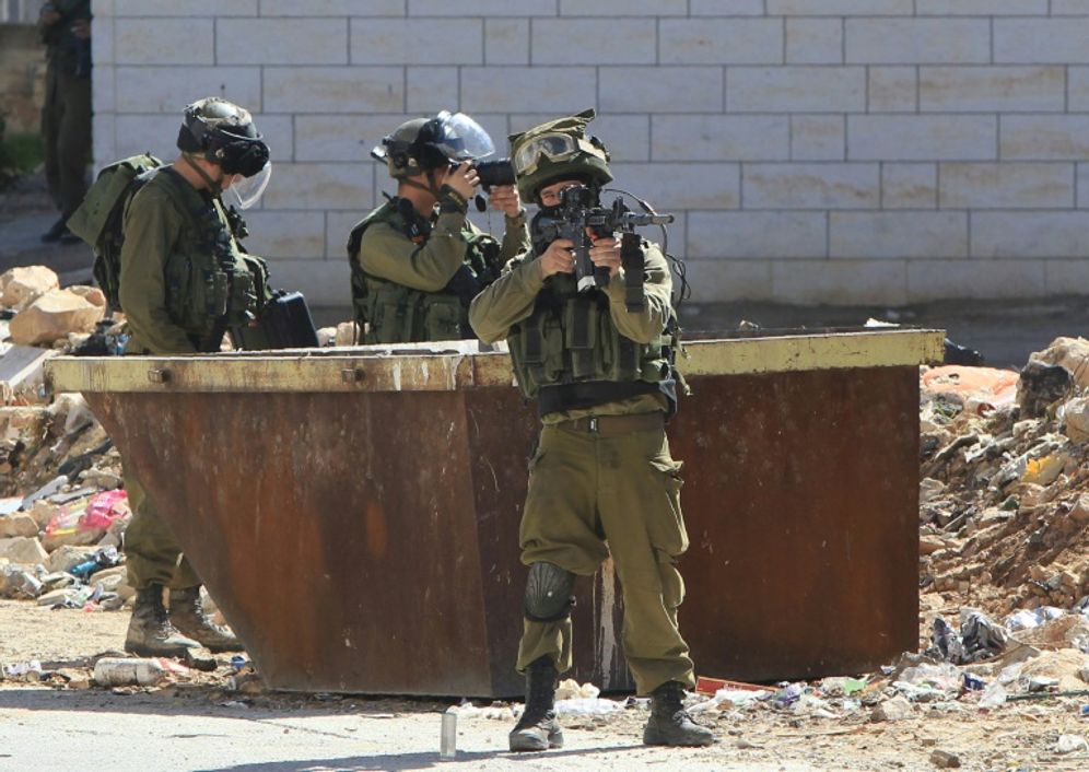 Israeli security forces in the Israeli occupied West Bank city of Hebron