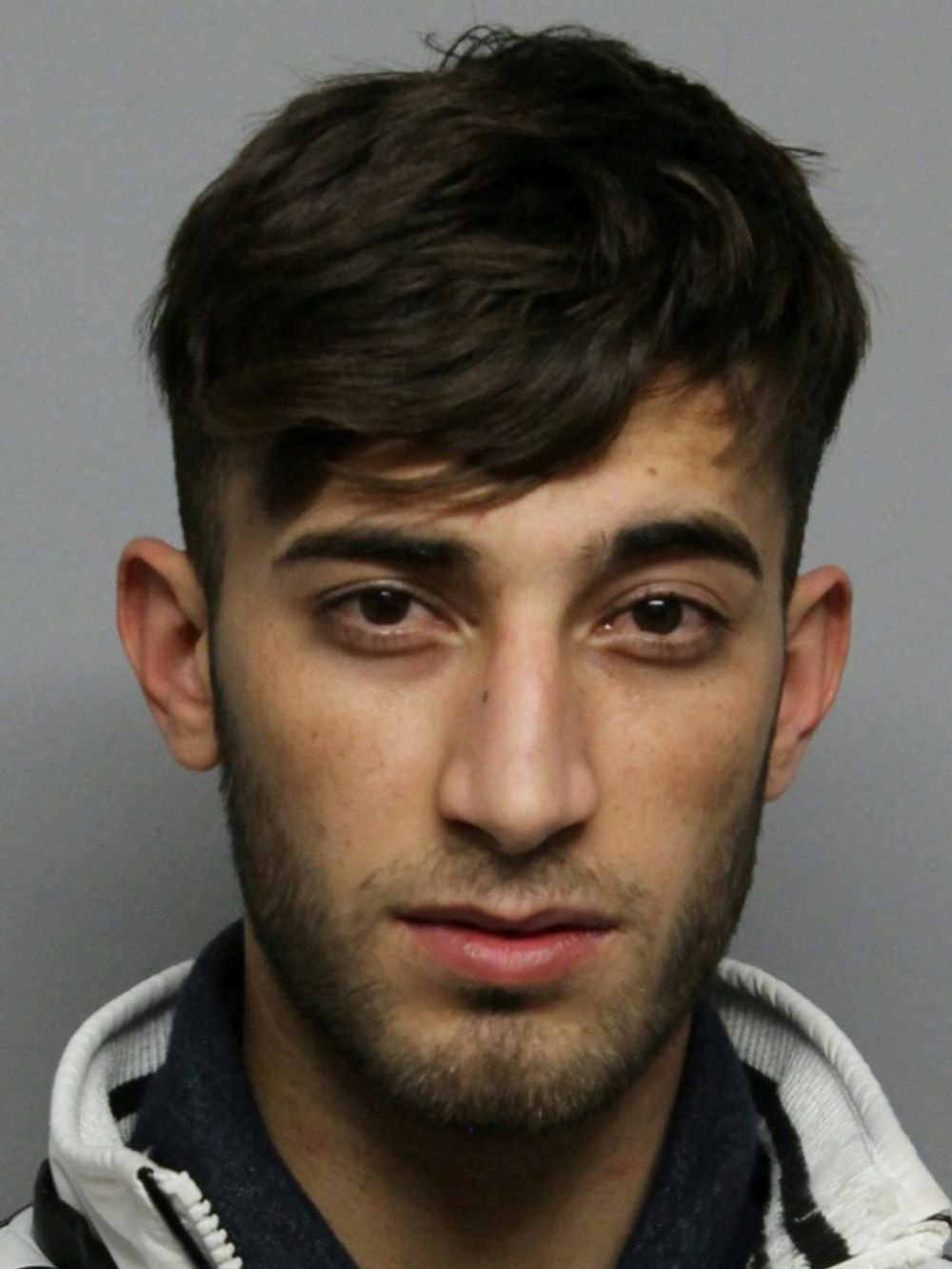 Police handout picture released June 7, 2018, of Iraqi asylum seeker Ali Bashar, suspected of the rape and murder of a teenage girl