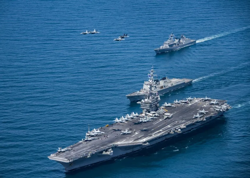 Earlier this month naval exercises were conducted in the Sea of Japan (East Sea) by the aircraft carrier USS Carl Vinson (pictured), with South Korean and Japanese aircraft also taking part