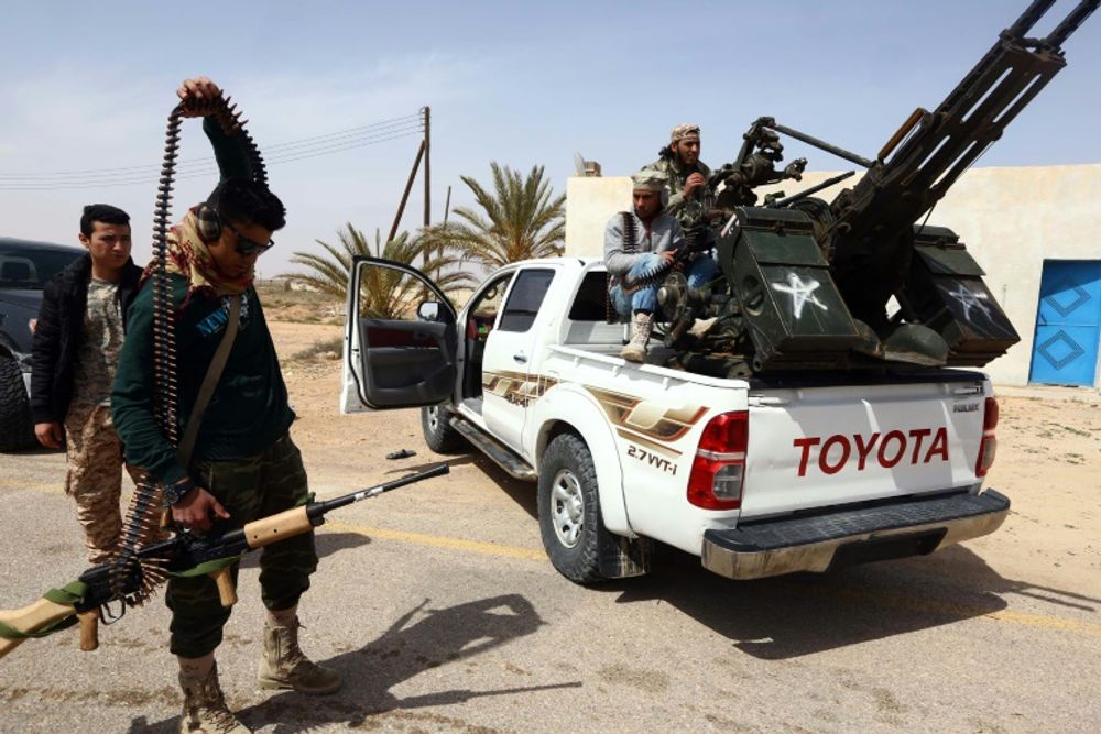 File picture shows forces loyal to Libya's Islamist-backed parliament General National Congress (GNC) during fighting against Islamic State (IS) group jihadists on the outskirts of Libya's western city of Sirte